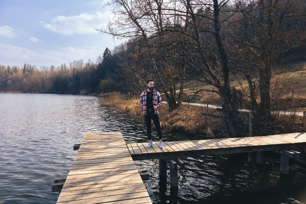 A man on a pontoon on Lake Türlersee in winter