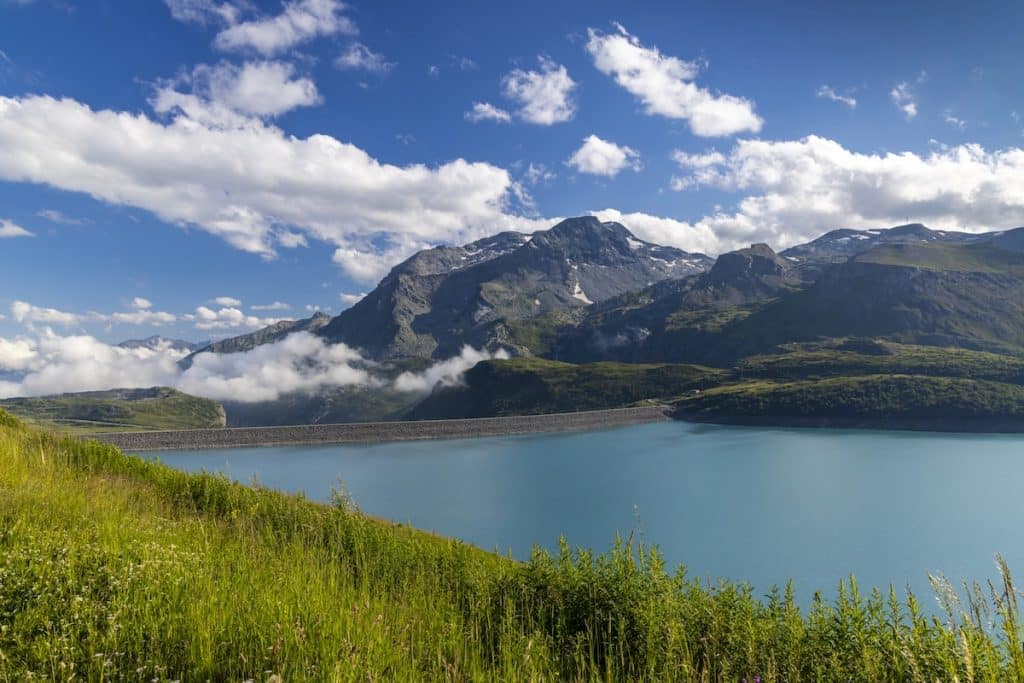Turquoise waters of Lake Mont-Cenis surrounded by Alpine peaks in Savoie, Auvergne-Rhône-Alpes